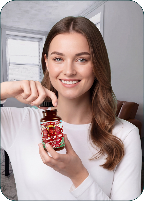 Woman opening a bottle of Orchard Tart Cherry capsules